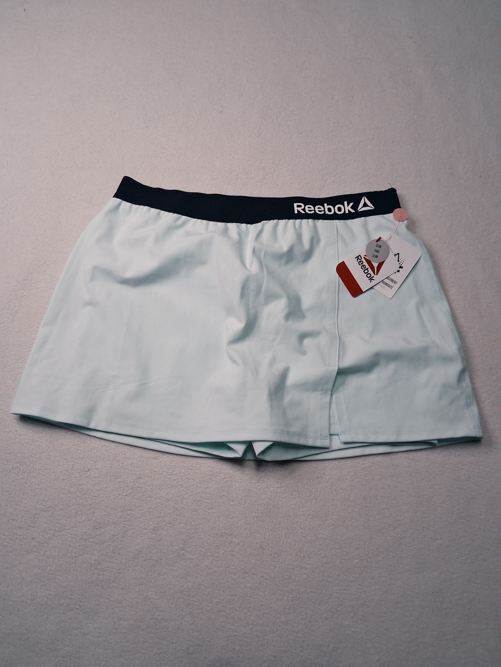 Reebok Women's Light Mint Athletic Shorts with Black Waistband